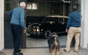  father and son working on restoring a classic 280SE in a garage from letters from vintage Mercedes owners