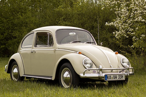 A cute little VW Beatle showing off it's high quality vintage car parts