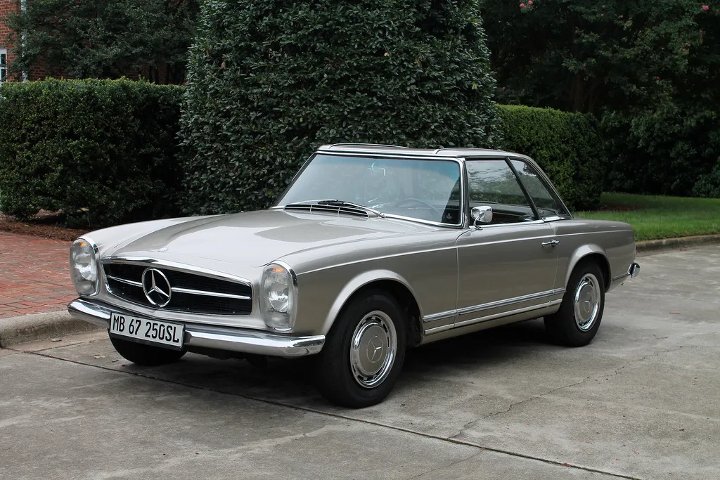 a sharp W113 showing off all of her top of the line classic Mercedes parts