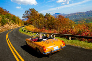 a 190SL Mercedes cruising down the Blue Ridge Parkway with the top down