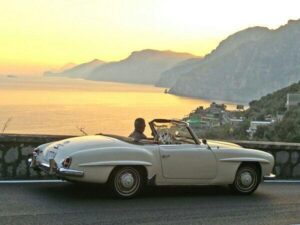 The Amalfi Coast Road is a great place to drive a beauty like the 190SL Mercedes (in the picture)