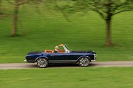 Taking the Mercedes 280SL for weekend drives is a very pleasurable experience as the man in the picture is experiencing